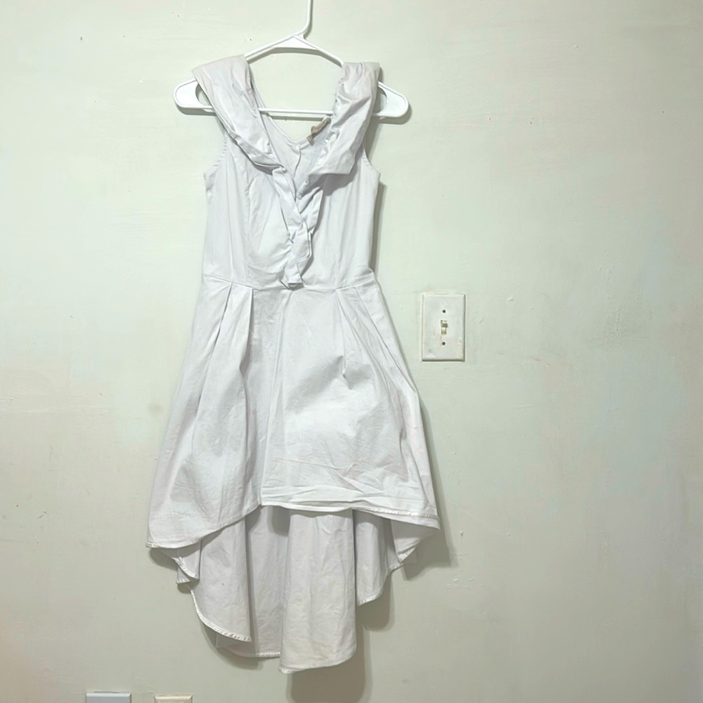White dress form the brand “rinascimento made in Italy”